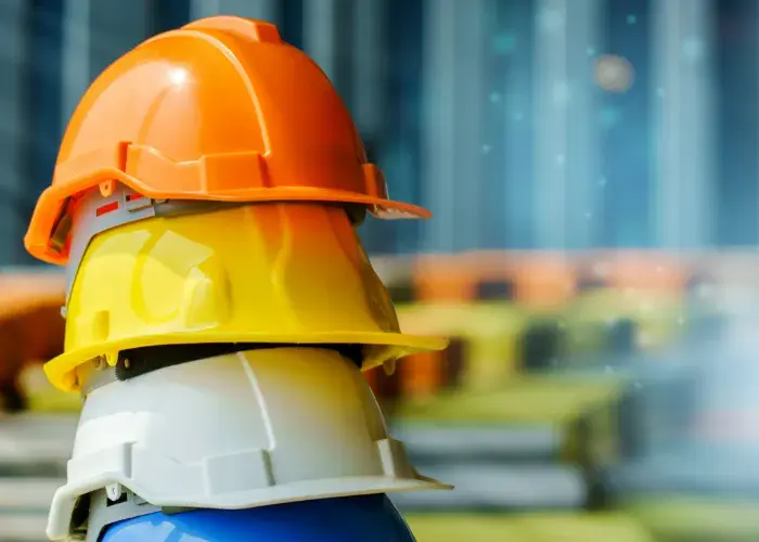 Construction hats stacked up ready for working at height