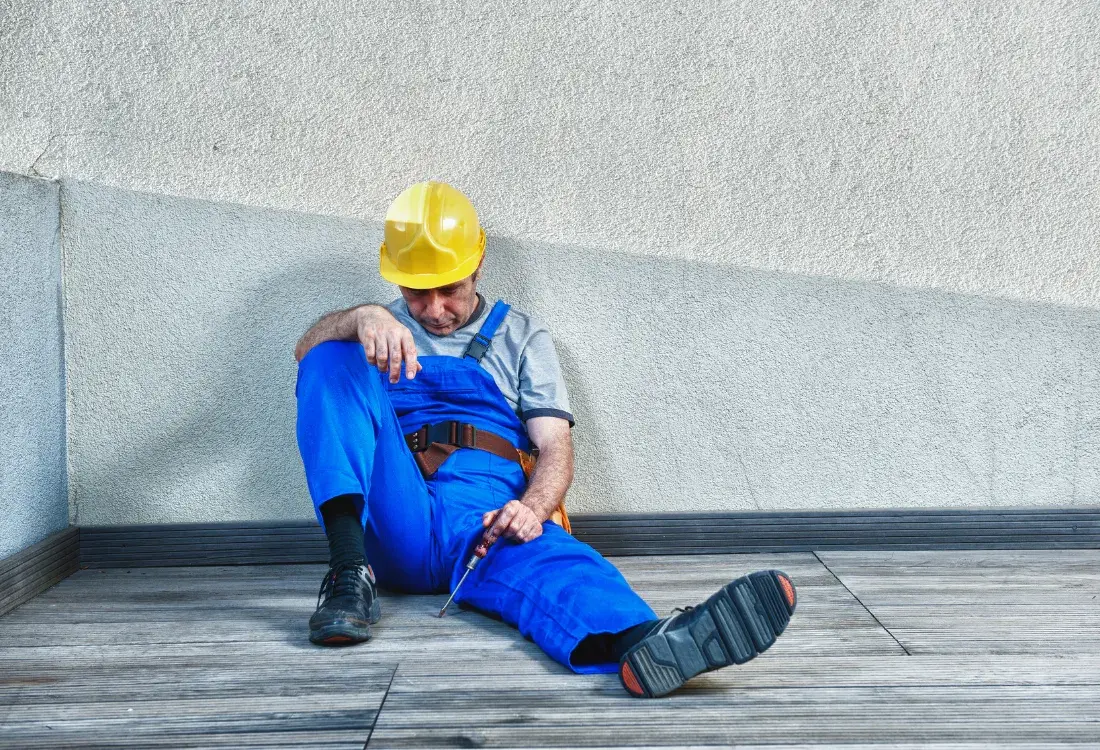 Construction worker on-site showing how sleep deprivation and work performance has an impact on each other.
