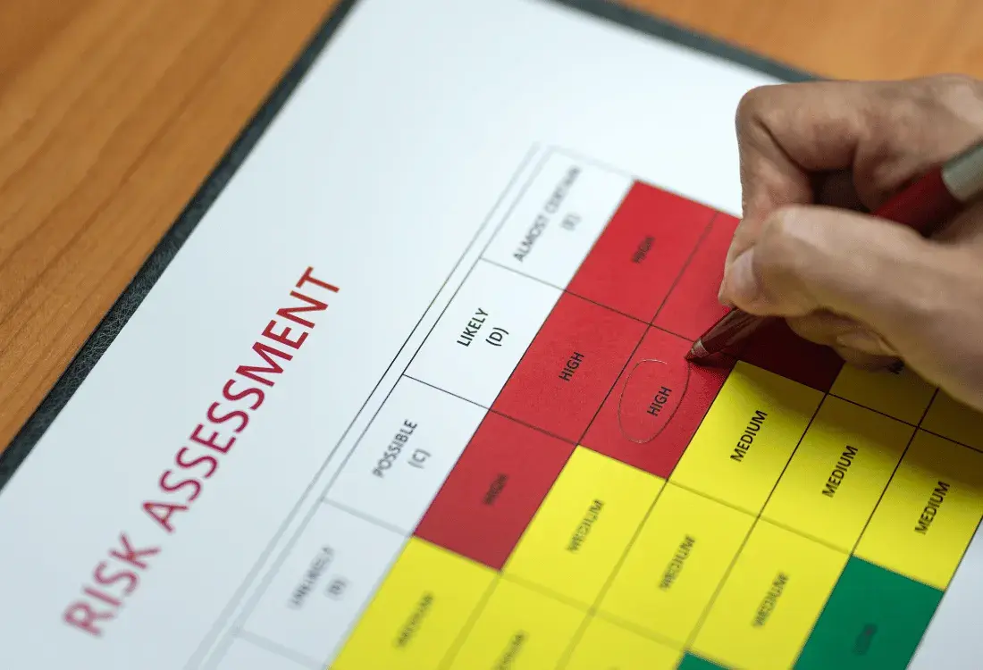 Employee conducting a risk assemnt before doing a job for health and saftety to prevent accidents