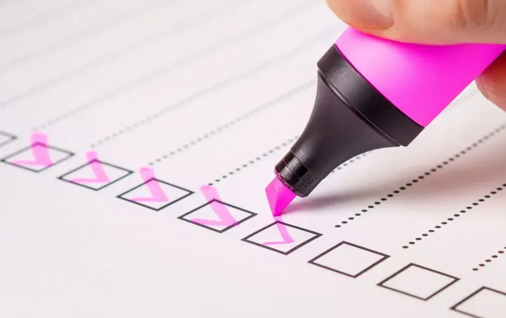 Pink highlighter ticking off Ability International's working from height checklist
