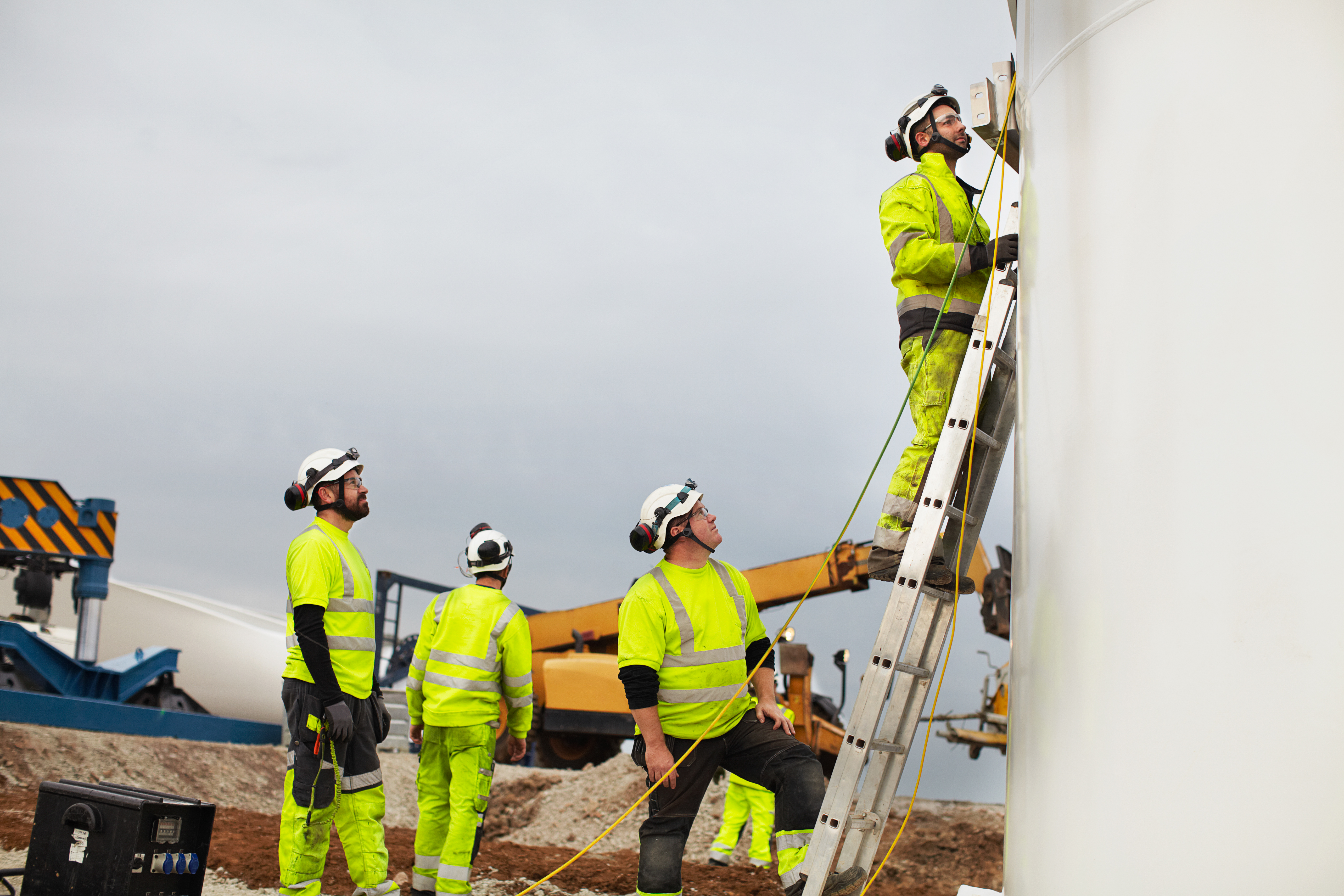 Worker at height wearing safety gear representing work at height training and compliance for workplace safety.